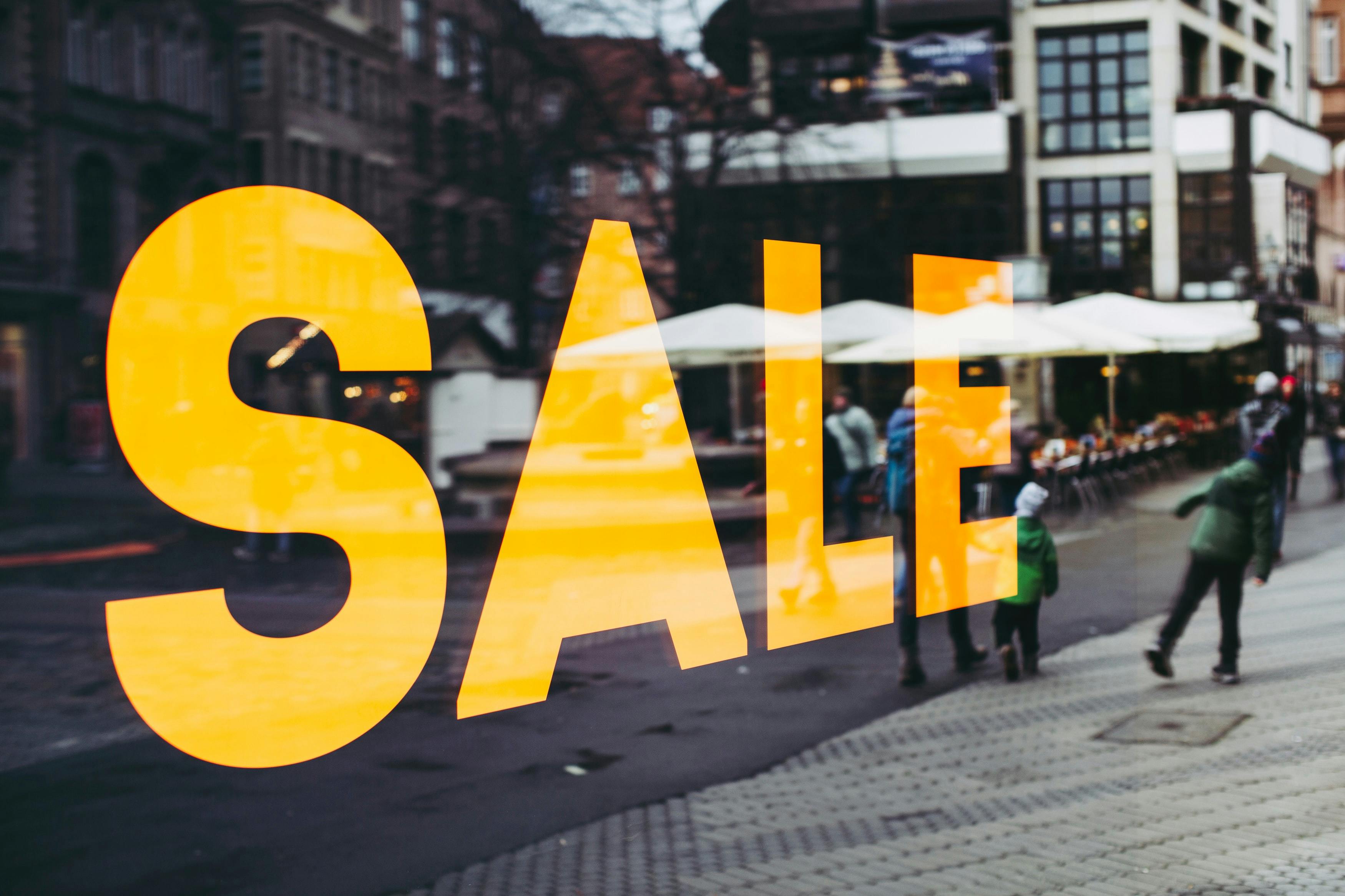 Image of a sale sign in a store window